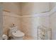 Modern bathroom with heated toilet and decorative tiled walls at 6322 E Turquoise Ave, Paradise Valley, AZ 85253