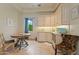 Convenient kitchenette with custom cabinetry and modern appliances, enhancing the bedroom's functionality at 6322 E Turquoise Ave, Paradise Valley, AZ 85253