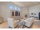 Elegant living room featuring a fireplace and custom built-in shelving at 6322 E Turquoise Ave, Paradise Valley, AZ 85253