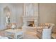 Living room showcasing fireplace and comfortable seating at 6322 E Turquoise Ave, Paradise Valley, AZ 85253