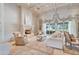 Spacious living room with fireplace, coffered ceiling and large windows at 6322 E Turquoise Ave, Paradise Valley, AZ 85253