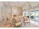 Bright living area boasts a decorative fireplace and custom drapery, offering a comfortable space at 6322 E Turquoise Ave, Paradise Valley, AZ 85253