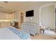 Spacious main bedroom features an ensuite kitchen, tiled floor, and archway entrance to a bright sunroom at 6322 E Turquoise Ave, Paradise Valley, AZ 85253