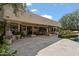 Expansive outdoor patio featuring stone flooring, a dining area, and ample seating, perfect for entertaining at 6322 E Turquoise Ave, Paradise Valley, AZ 85253