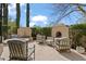 Cozy outdoor patio with fireplace, water feature, and comfortable seating, ideal for relaxation at 6322 E Turquoise Ave, Paradise Valley, AZ 85253