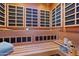 Inviting sauna with light wood panels, multi-level seating, and built-in lighting at 6322 E Turquoise Ave, Paradise Valley, AZ 85253