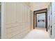 Spacious walk-in closet featuring custom built-in cabinets and drawers at 6322 E Turquoise Ave, Paradise Valley, AZ 85253