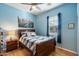 Cozy bedroom with wood furniture, and ample natural light at 2251 S Annie Ln, Gilbert, AZ 85295