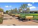 Walkway with benches and landscaping near shops at 2251 S Annie Ln, Gilbert, AZ 85295