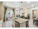 Kitchen island with granite countertop and stainless steel appliances at 2251 S Annie Ln, Gilbert, AZ 85295