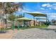 Modern playground with shade structures and play equipment at 2251 S Annie Ln, Gilbert, AZ 85295