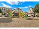 Modern playground with slides and climbing structures at 2251 S Annie Ln, Gilbert, AZ 85295