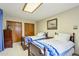 Bedroom with two beds and wood dresser at 2546 E Hale St, Mesa, AZ 85213