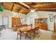 Dining room features a large wooden table and built-in hutch at 2546 E Hale St, Mesa, AZ 85213