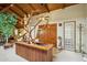 Inviting entryway with unique wood sculpture and double doors at 2546 E Hale St, Mesa, AZ 85213