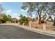 Single-story home with attached garage and mature trees at 2546 E Hale St, Mesa, AZ 85213