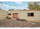 Detached garage with gravel driveway and storage area at 2546 E Hale St, Mesa, AZ 85213