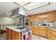 Bright kitchen with stainless steel appliances and an island at 2546 E Hale St, Mesa, AZ 85213