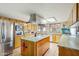 Kitchen with granite island and stainless steel appliances at 2546 E Hale St, Mesa, AZ 85213