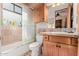 Well-appointed bathroom with a tub, shower, and updated fixtures at 2632 E Camina Plata --, Gilbert, AZ 85298