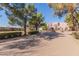 Grand estate entrance with paved driveway and landscaping at 2632 E Camina Plata --, Gilbert, AZ 85298