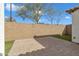 Small backyard with paved patio and grass at 2955 N Augustine --, Mesa, AZ 85207