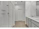 Clean bathroom with white subway tiles, a glass shower, and gray vanity at 2955 N Augustine --, Mesa, AZ 85207