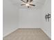 Spacious bedroom with carpeted floor and ceiling fan at 2955 N Augustine --, Mesa, AZ 85207