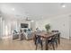 Dining area with a long wooden table and black metal chairs at 2955 N Augustine --, Mesa, AZ 85207