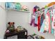 Well-organized closet with shelves and hanging rods at 4969 W Beckham Way, San Tan Valley, AZ 85144