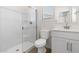 Bathroom featuring a shower with glass door, toilet, and vanity with a white sink at 7450 S 75Th Dr, Laveen, AZ 85339