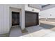 Exterior shot of a home featuring a driveway, garage door, and entrance at 7450 S 75Th Dr, Laveen, AZ 85339