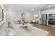 Open floor plan living space featuring a kitchen, dining area, and living room at 7450 S 75Th Dr, Laveen, AZ 85339
