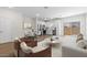 Open floor plan with the kitchen, dining area, and living room shown at 7450 S 75Th Dr, Laveen, AZ 85339