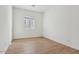 Simple bedroom with tile floor and a window offering natural light at 11512 E Utah Ave, Mesa, AZ 85212