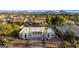 Attractive home features a Southwestern style, a tile roof, desert landscaping, and scenic mountain views at 14211 N Fountain Hills Blvd # B, Fountain Hills, AZ 85268