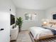 Cozy bedroom with a large window, stylish decor, and a comfortable bed at 14211 N Fountain Hills Blvd # B, Fountain Hills, AZ 85268
