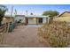 Charming home showcasing desert landscaping and a cozy covered patio at 14211 N Fountain Hills Blvd # B, Fountain Hills, AZ 85268