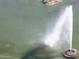 This is an aerial view of a decorative fountain on a pristine lake at 14211 N Fountain Hills Blvd # B, Fountain Hills, AZ 85268