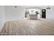 Spacious living room flows into a modern kitchen with stainless appliances and an island at 14211 N Fountain Hills Blvd # B, Fountain Hills, AZ 85268