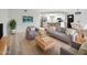 Bright, modern living room featuring stylish furniture, light wood floors, and an open concept design at 14211 N Fountain Hills Blvd # B, Fountain Hills, AZ 85268