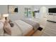 Bright main bedroom featuring light wood floors, ample natural light and stylish decor at 14211 N Fountain Hills Blvd # B, Fountain Hills, AZ 85268