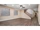 Living room with hardwood floors and a staircase at 1840 W Sierra Sunset Trl, Phoenix, AZ 85085