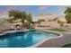 Inviting backyard oasis featuring a sparkling pool, spa, and relaxing patio area at 1840 W Sierra Sunset Trl, Phoenix, AZ 85085