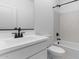 Modern bathroom with sleek fixtures, featuring an updated shower and vanity at 23411 W Albeniz Pl, Buckeye, AZ 85326