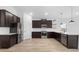 Spacious kitchen featuring stainless steel appliances, stylish cabinetry, and bright countertops at 23411 W Albeniz Pl, Buckeye, AZ 85326