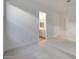 Neutral bedroom offering plush carpet, white walls, and an ensuite bathroom at 28233 N 134Th Ave Ave, Peoria, AZ 85383
