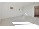 Spacious bedroom featuring neutral carpet, white walls, and natural light at 28233 N 134Th Ave Ave, Peoria, AZ 85383