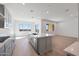 Stylish kitchen boasts a center island, stainless steel appliances, and an open layout at 28233 N 134Th Ave Ave, Peoria, AZ 85383