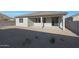 Low maintenance backyard with covered patio and gravel, offering a serene and private outdoor space at 34505 N Timberlake N Mnr, San Tan Valley, AZ 85144